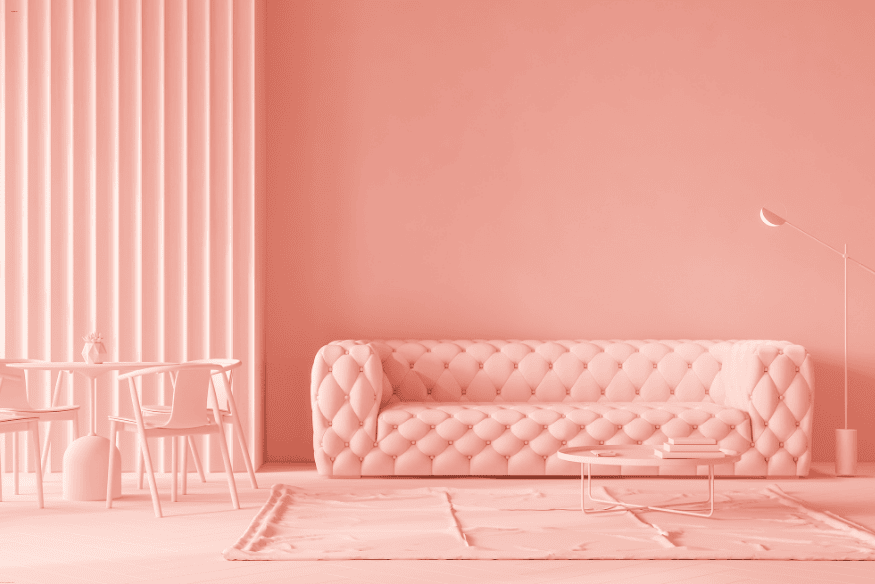 Sala pequena com sofá capitonê e paleta monocromática, estilo contemporâneo.