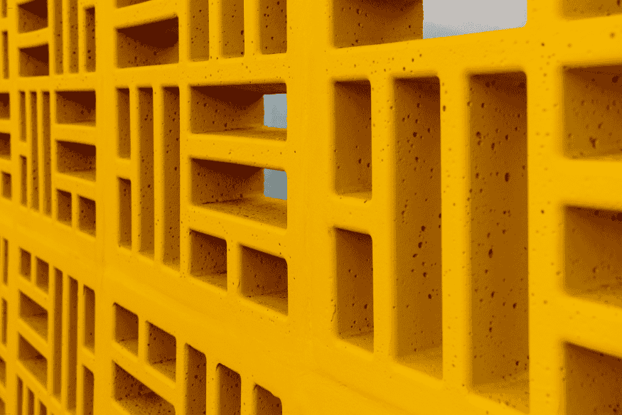 Parede de cobogó amarelo moderno para ventilação e iluminação natural em quartos